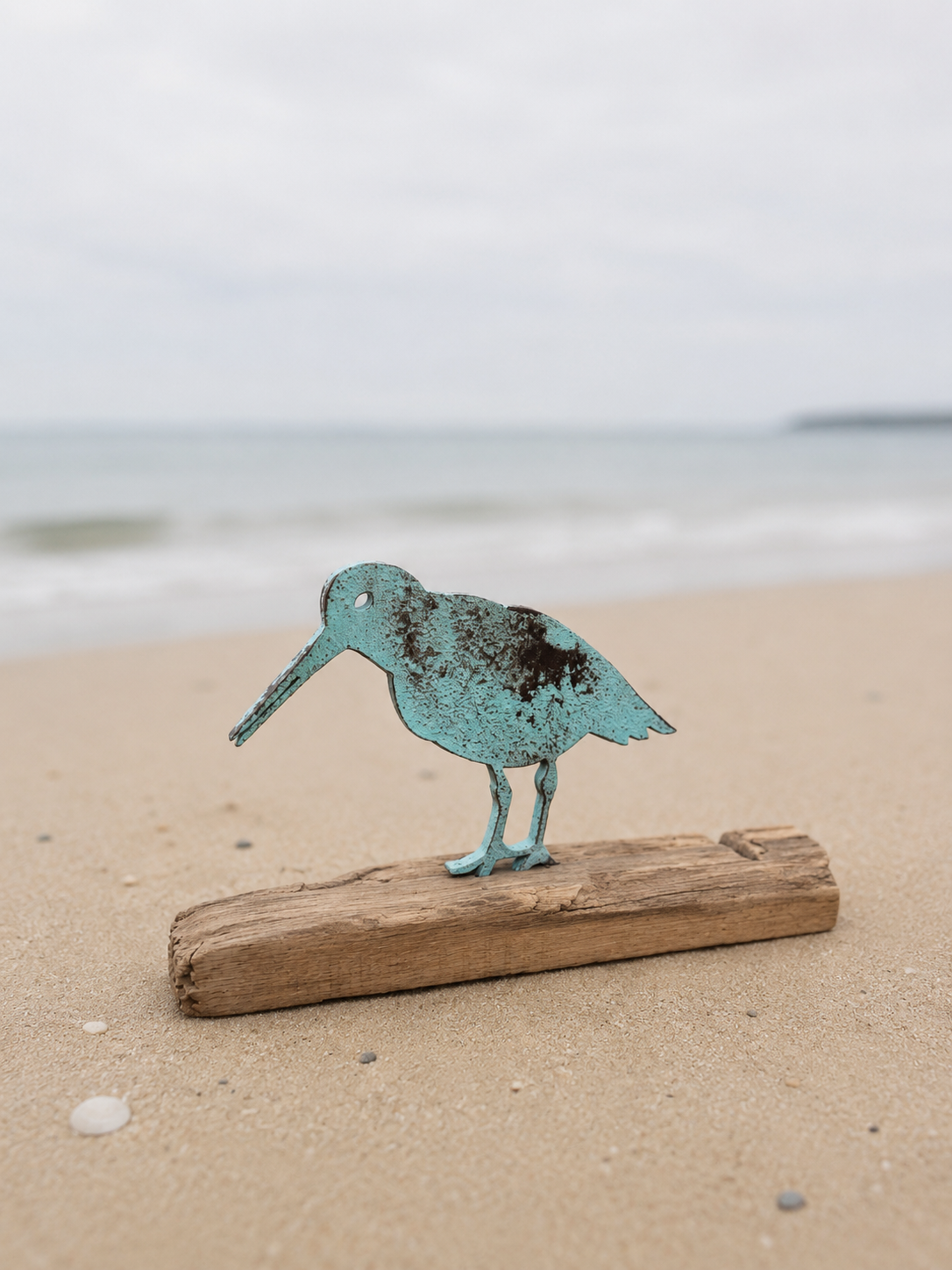 Driftwood Skulptur „Austerfischer Petrol“